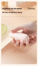 2 Pcs Pink Pig Mini Handheld Heat Sealing Machine for Food Bags – Compact, Portable, USB Rechargeable