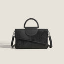 Black Elegant crocodile embossed clutch - with metal top handle and shoulder strap