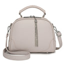 Beige Chic Mini Round Crossbody Bag for Women - Elegant Handbag with Tassel Accent