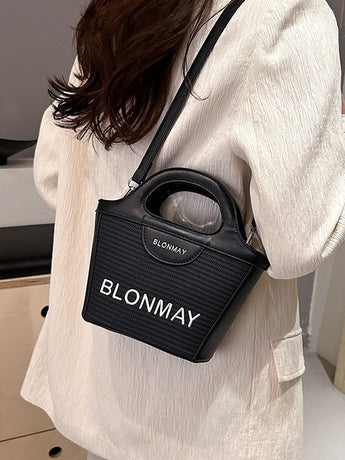 Small and lightweight black BLONMAY bucket bag, perfect for everyday use