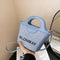 Small and lightweight blue BLONMAY bucket bag, perfect for everyday use