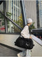 Black Unisex Travel Bag with Utility Buckles and Wet/Dry Compartments