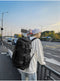 Black Unisex Travel Bag with Utility Buckles and Wet/Dry Compartments