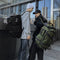 Green Unisex Travel Bag with Utility Buckles and Wet/Dry Compartments