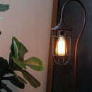 Industrial Floor Lamp with Adjustable Cage Shade Rustic Brushed in Bronze Finish